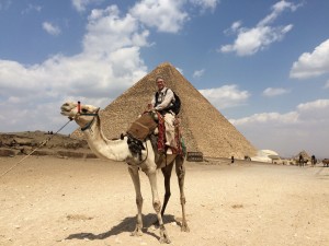 Eric on a camel in front of Giza pyramid